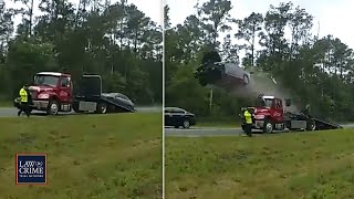 Distracted Florida Driver Launches Car Off Tow Truck Ramp at High Speed on Highway [upl. by Neelyhtak]