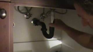 How to clean out a sink drain Reinstalling the adjustable ptrap [upl. by Datnow]