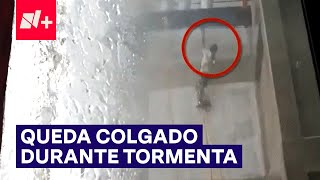 Trabajador quedó colgado en edificio de Lomas de Angelópolis durante tormenta  N [upl. by Ahsikel]