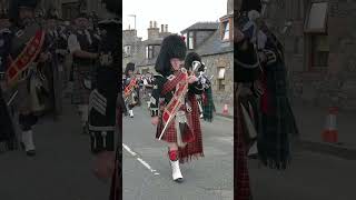 The massed Pipes amp Drums playing on the march after 2022 Dufftown Highland Games in Scotland shorts [upl. by Kcirderf56]