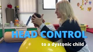 Facilitating head control to a dystonic quadriplegic child with cerebral palsy NDT intervention [upl. by Lepine]