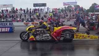 2014 MIROCK  Top Fuel Larry McBride and Dave Vantine Run the First 5 second sidebyside pass [upl. by Anivla]