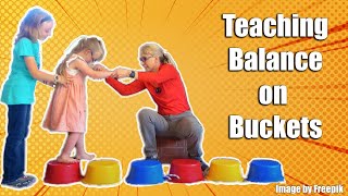 Learning to Balance Walking on Buckets Physical Therapy for a Child with Low Tone 189 [upl. by Haelak]