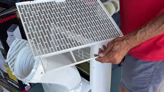 How to clean the Filter on a Toshiba 14000 BTU Air Conditioner [upl. by Ode]