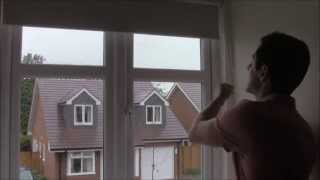 FITTING A BLACKOUT ROLLER BLIND  YouTube  recess fit roller blind [upl. by Pathe]