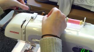 How to wind a bobbin and thread a Janome DC3050 sewing machine [upl. by Winna]