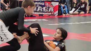 JiuJitsu finals grey belt girl chokes orange belt boy wins by points [upl. by Synned]