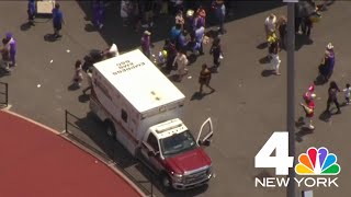 3 people age 13 63 and 78 suffer heat exhaustion at high school graduation  NBC New York [upl. by Ynnavoeg877]