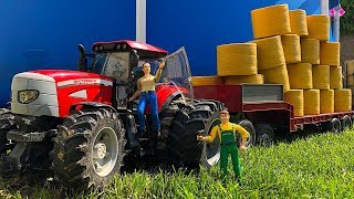 BRUDER Toys Farm TRAKTOR McCormick Pulls BIG Low loader truck [upl. by Sebbie]