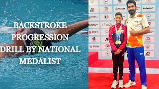 Backstroke Drill Progressions  Improve Your Technique  Krishiv Doshi [upl. by Eissert879]