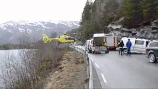 Helicopter lands on Crash BarrierHelicopter balances on crash barrier after car accident [upl. by Domeniga]