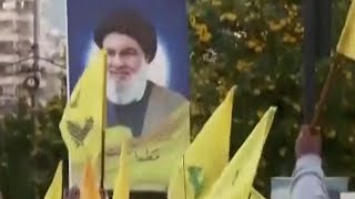 Beirut nella roccaforte di Hezbollah si festeggia il cessate il fuoco bandiere e foto di Nasrallah [upl. by Howard]