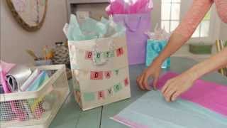 Giftology How to Fill a Gift Bag with Tissue [upl. by Ellevel130]