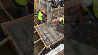 Contractors Pouring Cement at Work Site [upl. by Ifill771]