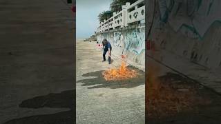 Extinguishing a fire with a container containing a special liquid [upl. by Leeke]