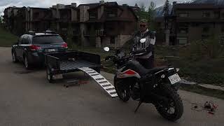 How to load a motorcycle singlehandedly onto a trailer using an electric winch in relative safety [upl. by Iret]