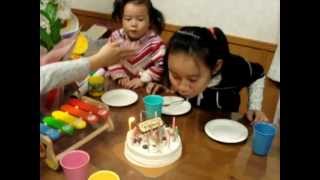 Funny girl blowing candle on sisters birthday cake [upl. by Britni398]