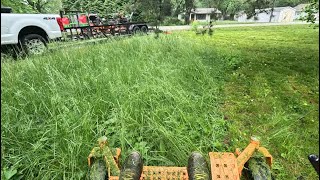 Mowing a LARGE overgrown property [upl. by Yrollam541]