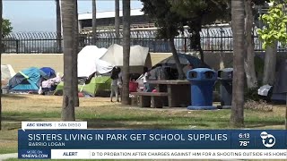 Community member gives school supplies for sisters living in park [upl. by Ydieh]