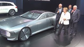 Angela Merkel looks at MercedesBenz IAA Concept [upl. by Ytirehc]