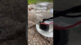 Discharging damaged LiPo battery 4S Tattu RLine 850mAh in salty water fpv 4s fpvdrone crash [upl. by Delahk]