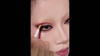 The girl is enhancing her beauty by applying makeup on her face makeup makeuptutorial leteat let [upl. by Fenner]