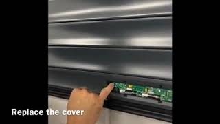 CHANGE THE BATTERY IN THE BOTTOM EDGE TRANSMITTER OF A EUROLL UK ROLLER GARAGE DOOR [upl. by Adnawot]