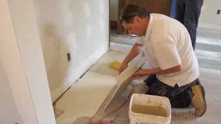 How To Install Ceramic Floor Tile  NJ Kitchens and Baths [upl. by Annaeirb]