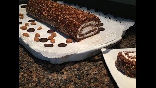 كيك رولي او سويس رول بالشوكولا و كلاصاج براليني بطريقة مبسطة جدااا CHOCOLAT COFFECARAMEL SWISS ROLL [upl. by Remark416]