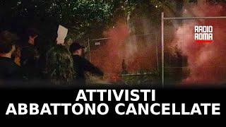 Sgombero in viale Pretoriano attivisti abbattono cancellate [upl. by Olnek772]