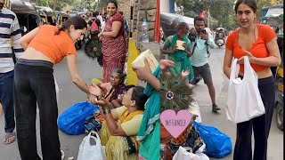 Sara Ali khan helping needy people infront of media [upl. by Munsey]