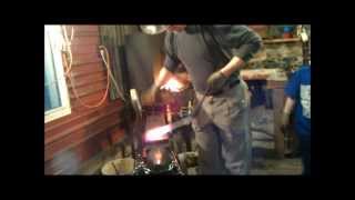 Forging a plant hanger from an old railroad spike [upl. by Jegar]