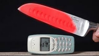 EXPERIMENT  Glühende Metall Messer VS Nokia 3310 [upl. by Woolcott420]