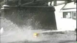 Snowmobile Hits bridge while watercrossing [upl. by Dnalyr950]