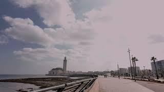 Casablanca Mid Morning Walk along the shoreline to Hassan II Mosque [upl. by Lebasiram151]