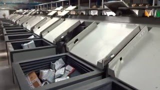 Tilt Tray Sorter by Falcon Autotech [upl. by Kentiga331]