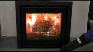 Pevex Serenity 50 56kW Modern inset multi fuel stove [upl. by Ahsinik]