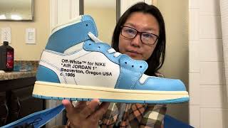 This is a pair FAKE Air Jordan 1 off white shoes [upl. by Htebasil]