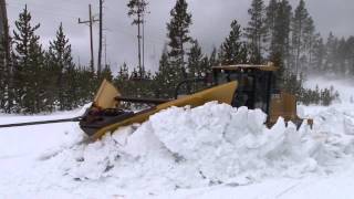 Plowing snow from roads in the spring in Yellowstone National Park [upl. by Celine]