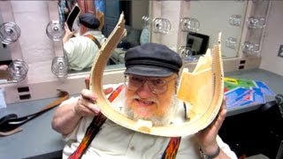 NERDGASM George RR Martin Destroys Guitar at ComicCon 2013 [upl. by Purdum746]