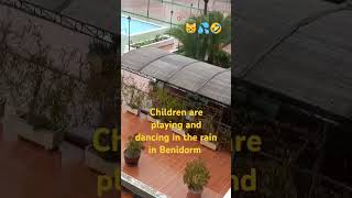 big storm in Benidorm and children are playingdancing in the rain💦🤣benidormremix shortsubscribe [upl. by Bever361]