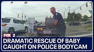 Dramatic rescue of baby caught on police bodycam [upl. by Erich]