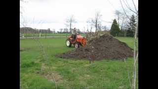 Kubota B115 moves dirt with selfmade front hydraulic lifter [upl. by Navets710]