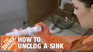 How to Unclog a Kitchen Sink  The Home Depot [upl. by Neibaf]