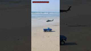 RC Blackhawk helicopter circling around 6x6 Chevy Apache rc truck shorts [upl. by Ahcire]