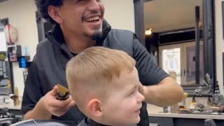 Adorable kid cant stop laughing while getting his hair trimmed  WooGlobe [upl. by Adirem444]