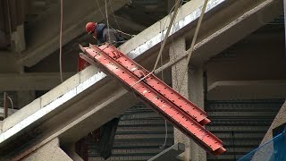 Beam falls from near top of South Station Tower construction site [upl. by Ttej10]