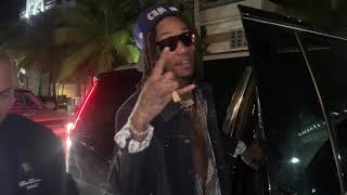 Wiz Khalifa Dines With An Entourage Of Woman In Miami Beach 020420  Celebrity News  Splash News [upl. by Spiegel]