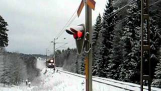 NetRail freight train pulled by Ma 825 Electric locomotive passing a level crossing at Bystad [upl. by Renate]