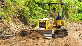 Dozer Komatsu D21A pushing and grading Dirt full power [upl. by Nnairek292]